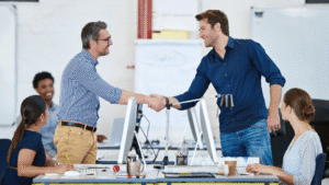 Founders discussing strategic partnerships for startups in a meeting Title: Structuring a Startup Partnership